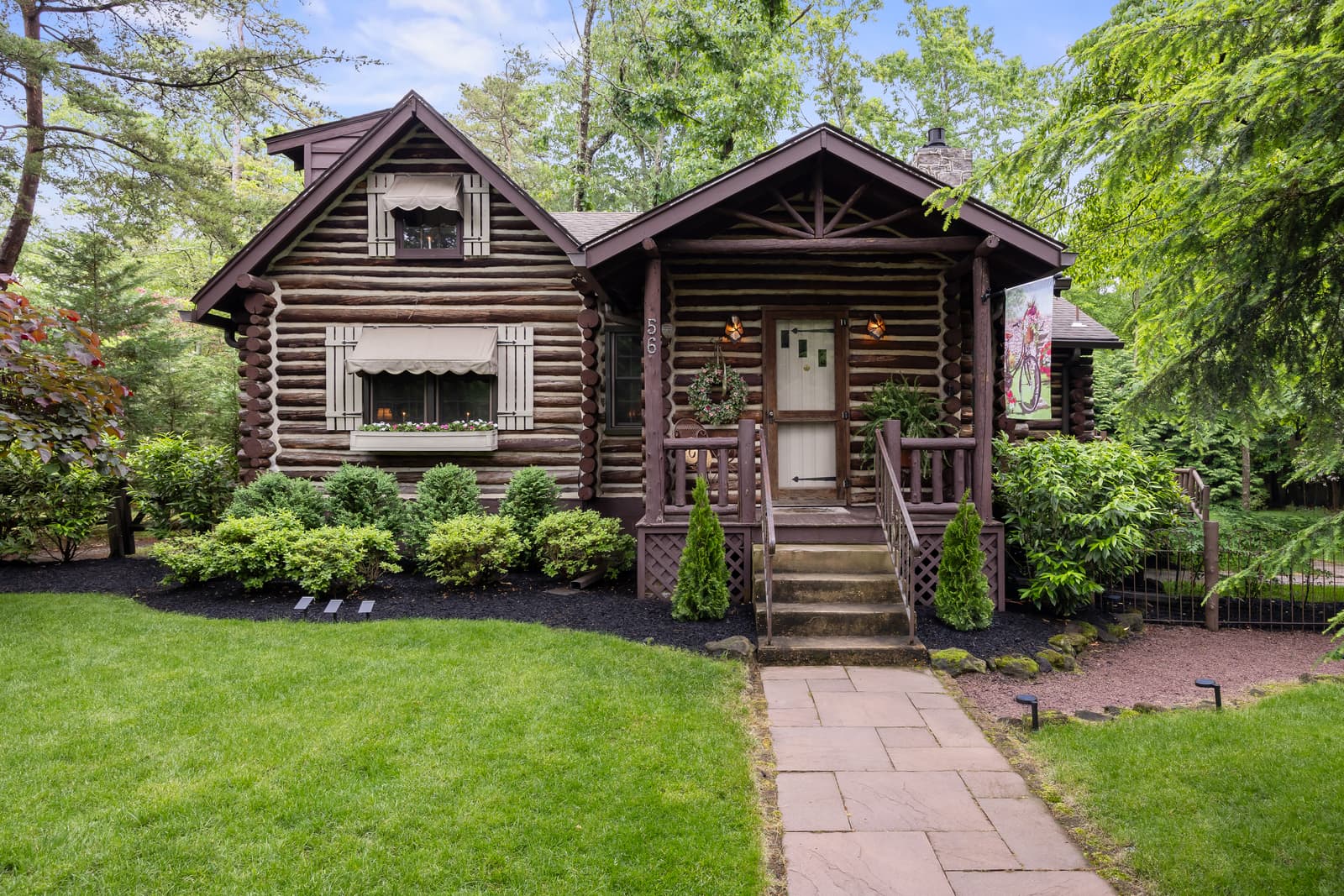 Log cabin home exterior set among the trees in Medford, NJ
