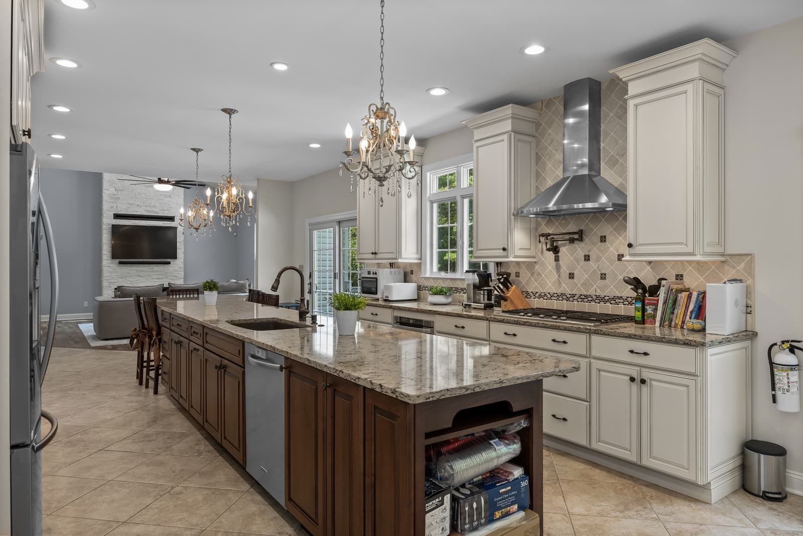 Chef's kitchen with a large center island and range hood in Medford, NJ