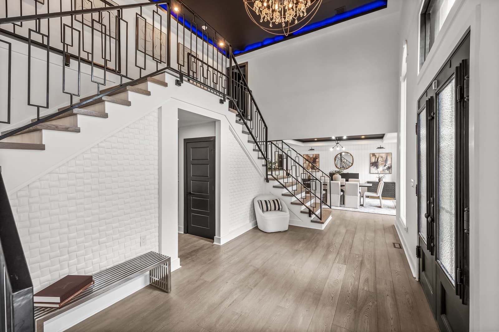 Bright entry foyer with a staircase and wood floors in Medford, NJ