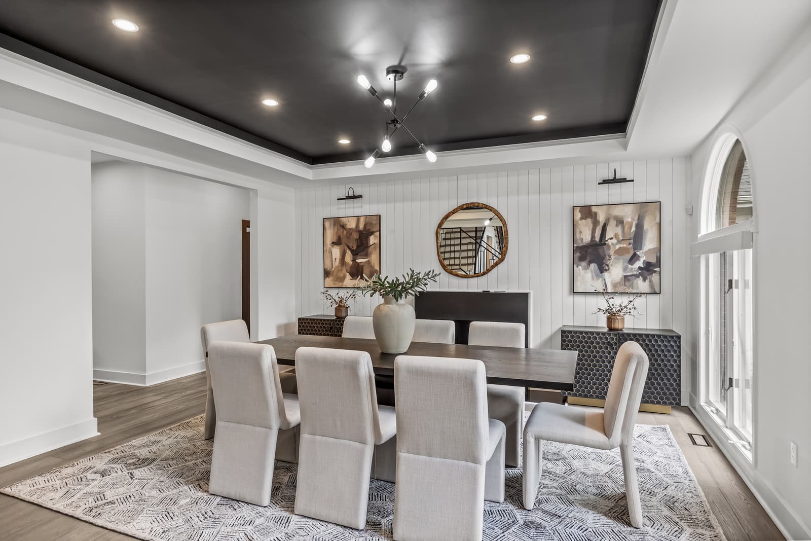 Formal dining room with a tray ceiling and chandelier in Medford, NJ